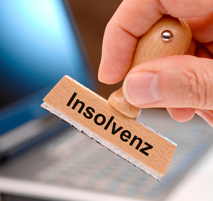 Insolvenz-Stempel als Symbol für wirtschaftliche Risiken bei Kunden